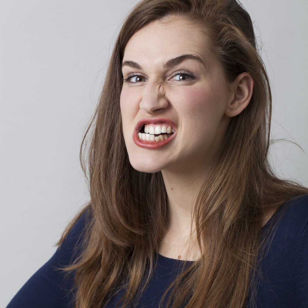 girl grinding her teeth