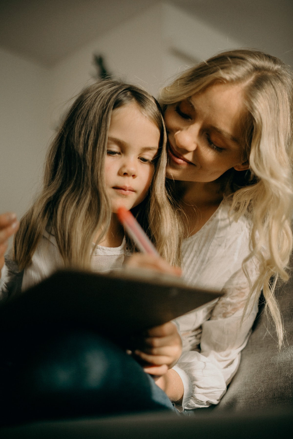 Mother teaching her daughter