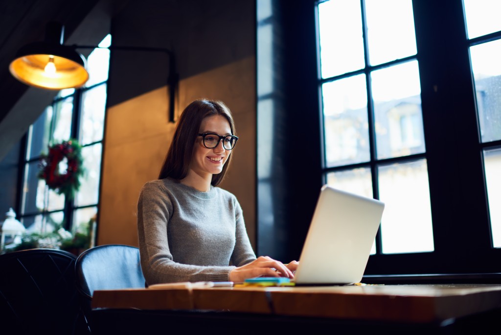 Woman using her laptop