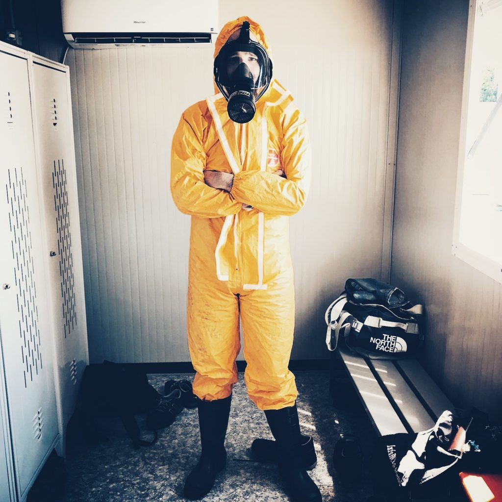 Man wearing a hazmat suit