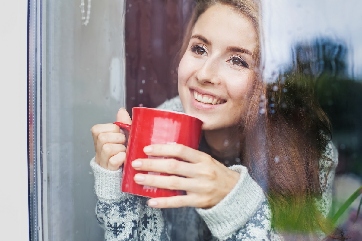 woman drinking hot coffee