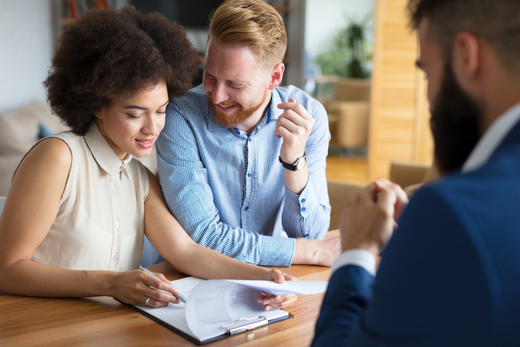 couple talking to agent