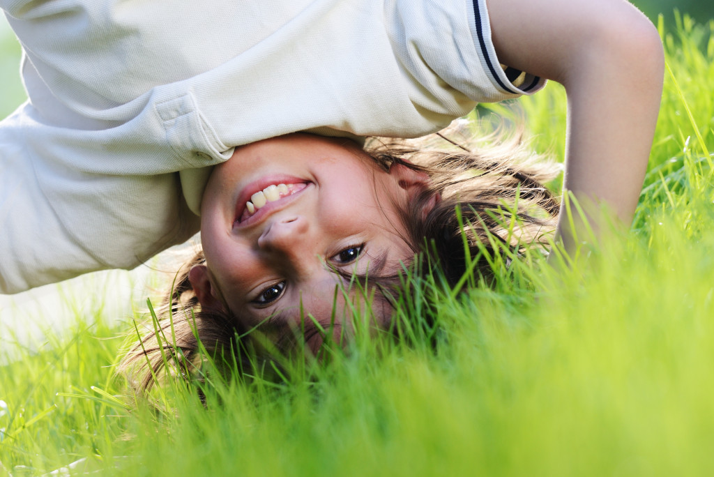 child doing handstand