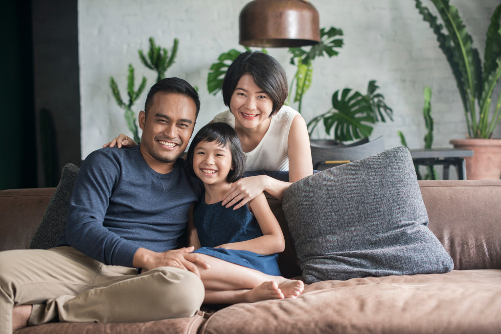 family sitting on the couch