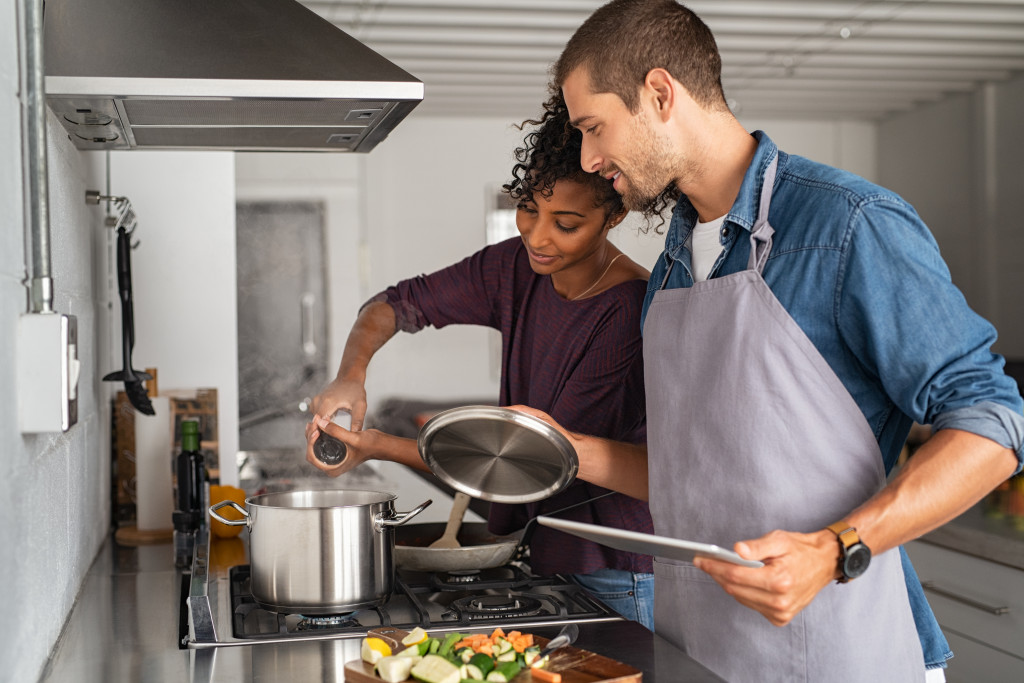 Couples cooking food