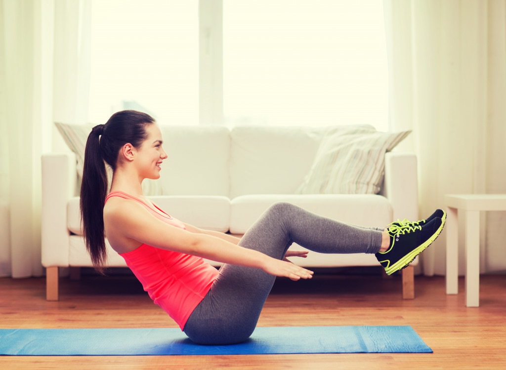 A woman working out at home