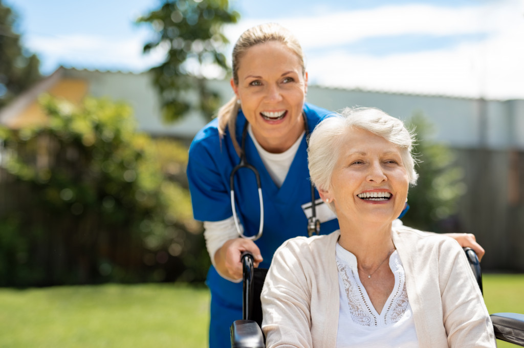 woman on a wheelchair smiling