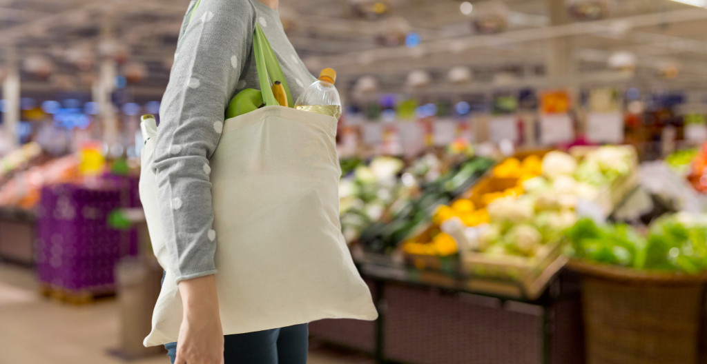 woman carrying an eco bag for groceries