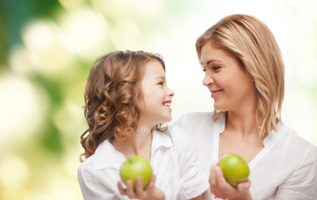 good health and healthy foods conceot for mom and daughter