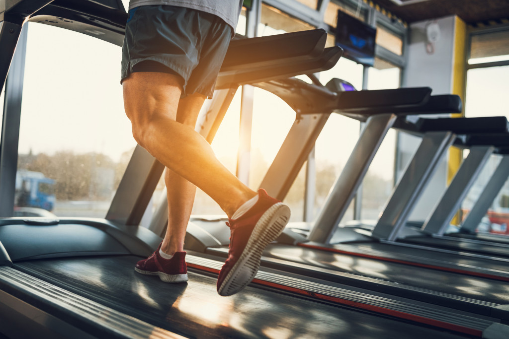 A man using a treadmill in the gym