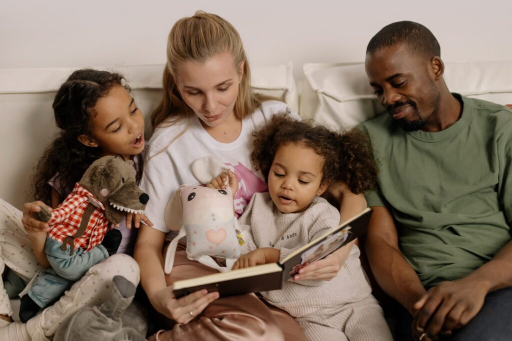 family reading bed time stories