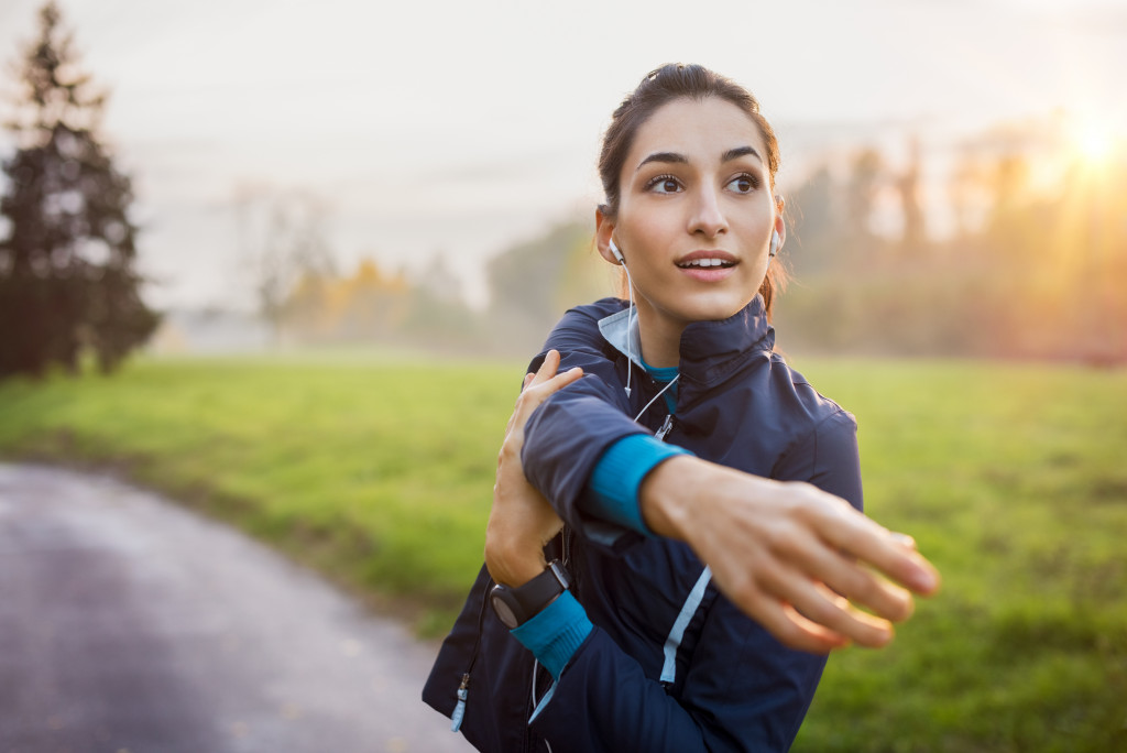 woman stretching before going for a run