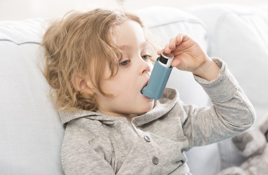 a child using inhaler device for asthma