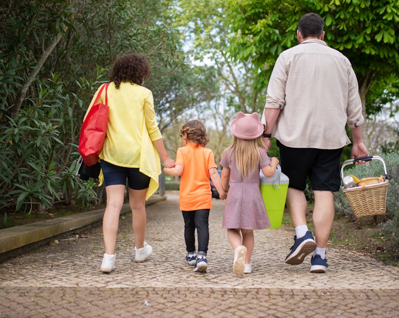 a family walking home from the park